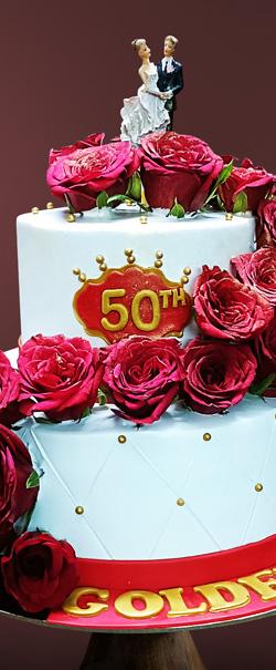 Pink celebration cake with buttercream details